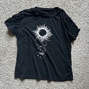 Womens black tee shirt with white sun and moon design